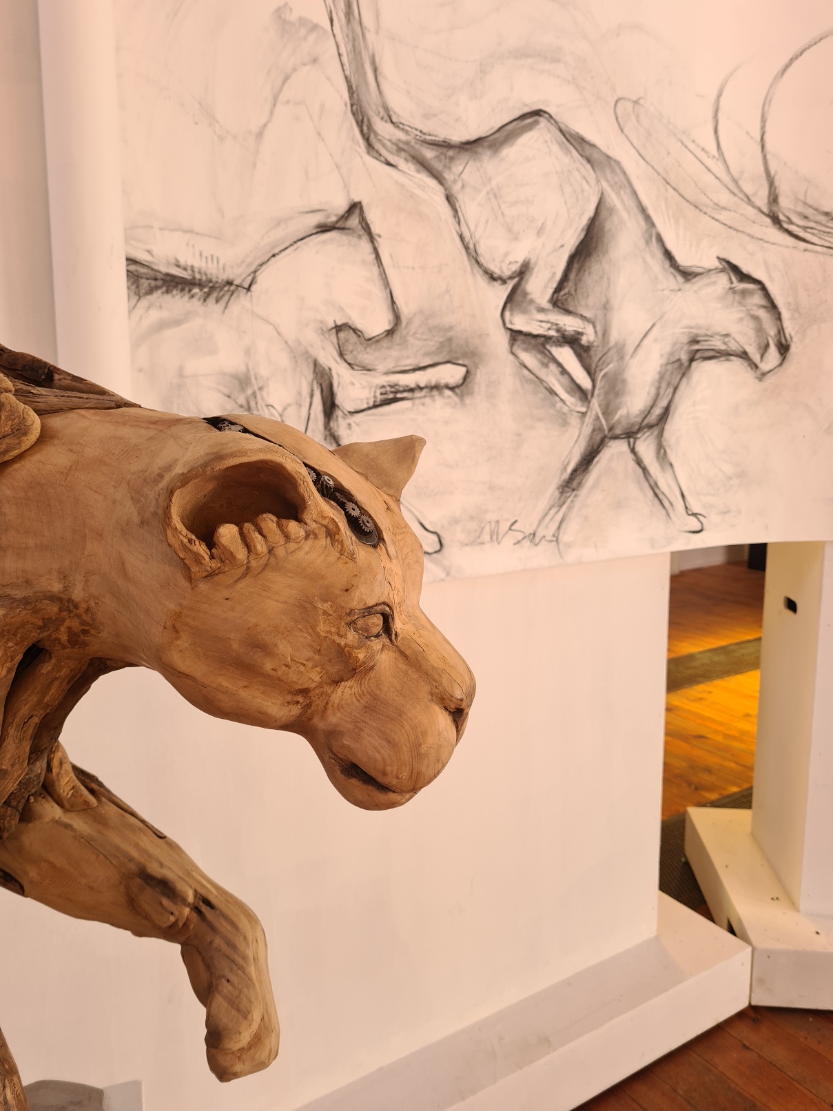 feline art combining sculpture and drawing